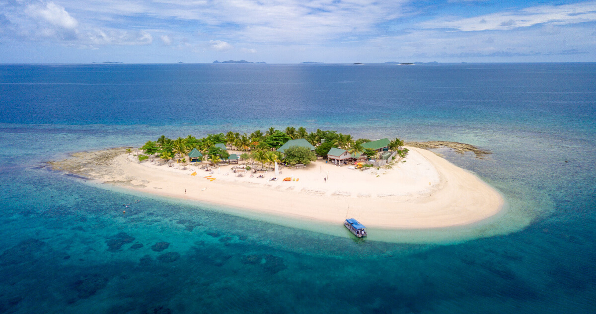 Aerial view of South Sea Island in Fiji, location of one of the Ocean Swim Fiji swims courses.